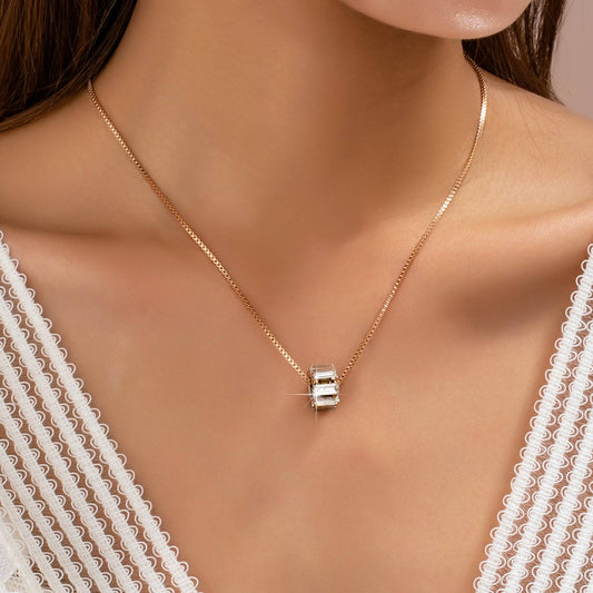 Gold-Tone Baguette Crystal Barrel Pendant Necklace