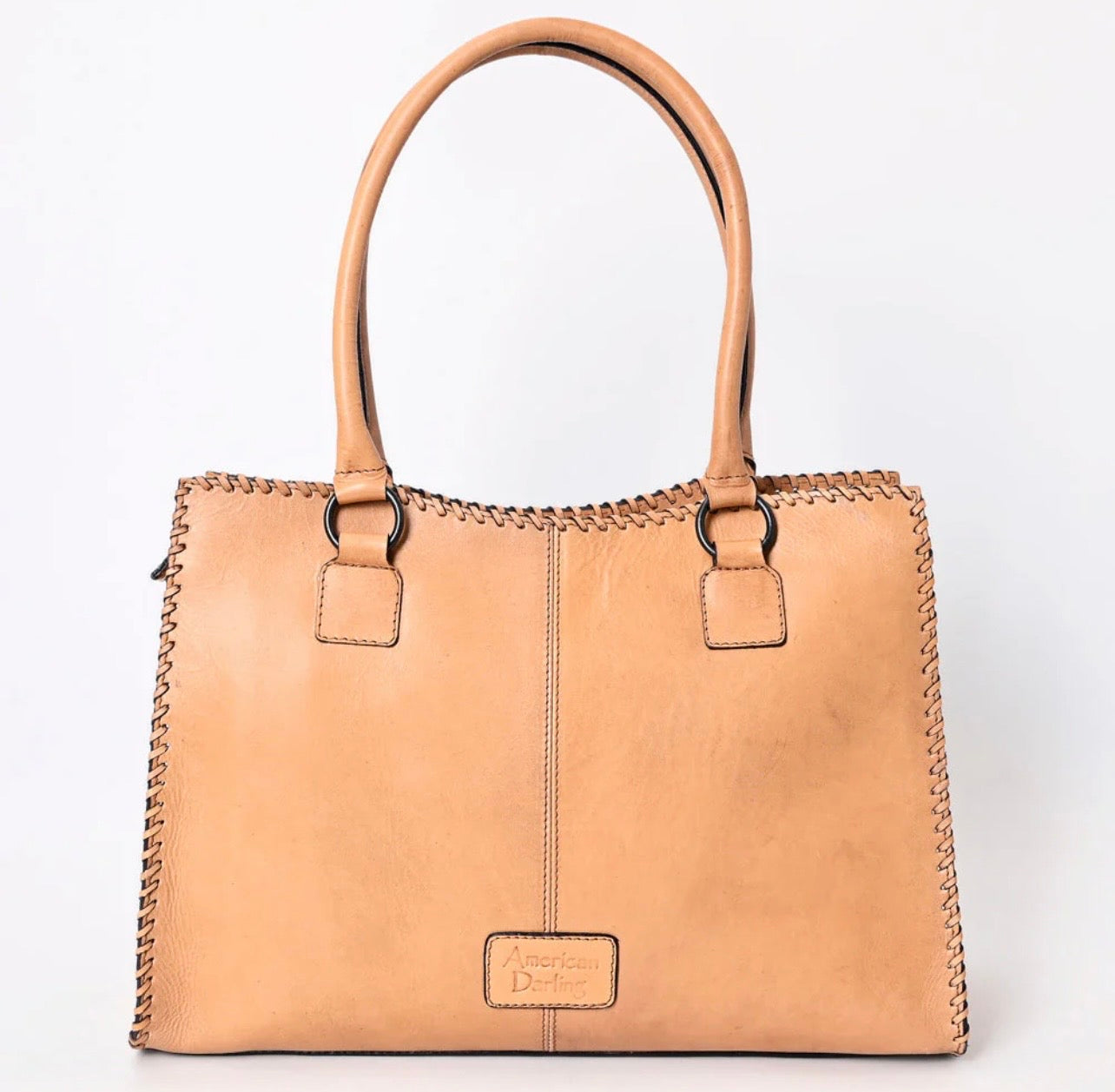 Natural tooled AD bag